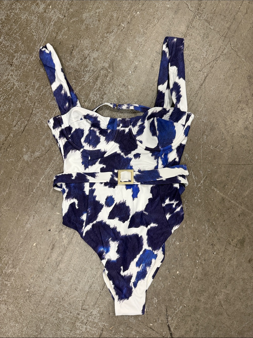 WeWoreWhat White and Blue Abstract One-Piece Swimsuit with Buckle Detail